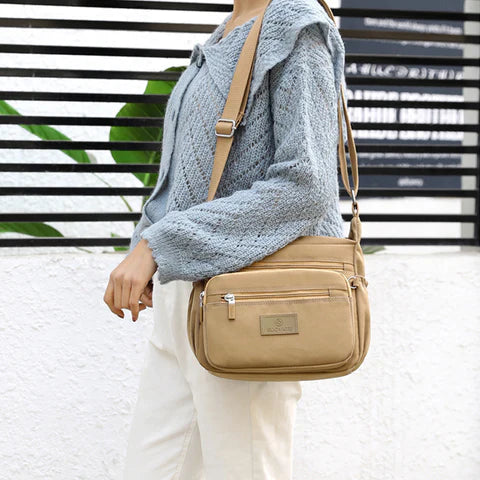 Bolsa Compacta Resistente à Água e Fechamento em Zíper